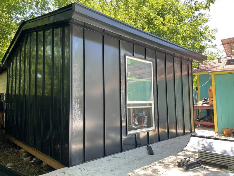 Black standing seam metal wall panels for Roof Inspection in Marina